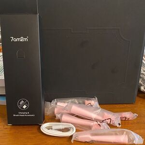 7am2m Electric Toothbrush charging and brush head accessory in Pink